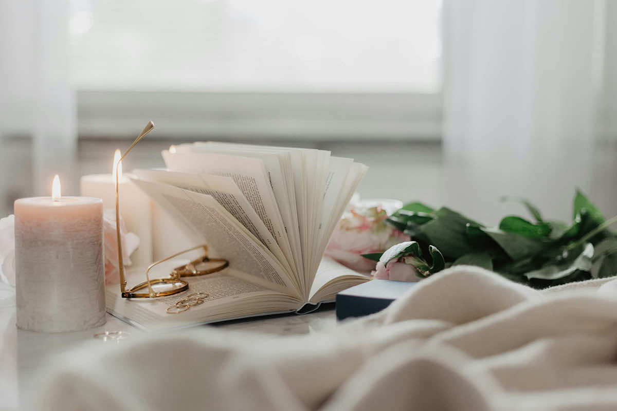 Book next to a candle