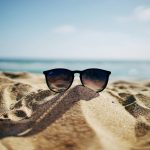 Sunglasses in the sand
